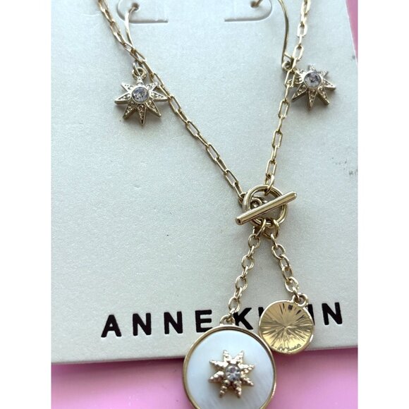 Anne Klein Gold-Tone Starburst Pendant Necklace & Drop Earrings Set With Crystal - Picture 2 of 3